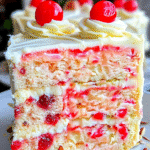 Cherry Almond Cake with White Chocolate Frosting