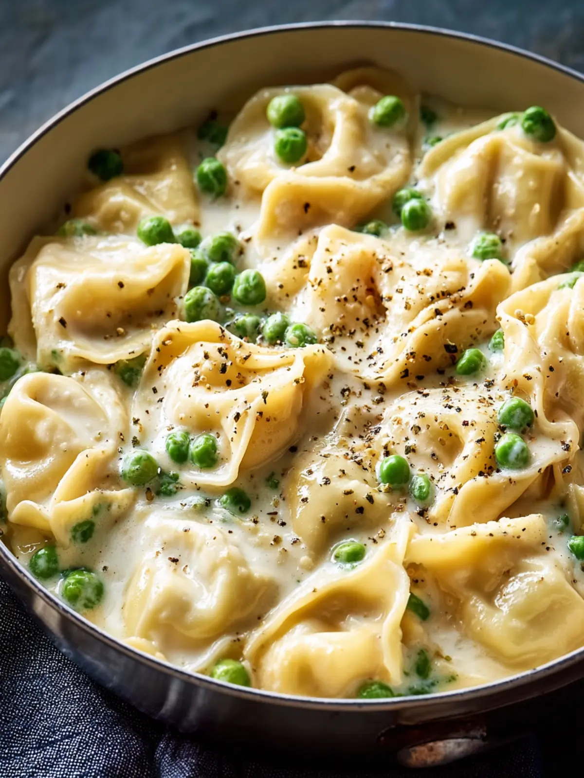 Creamy Tortellini Alfredo with Peas A Velvety Delight Third Image u5hcnl